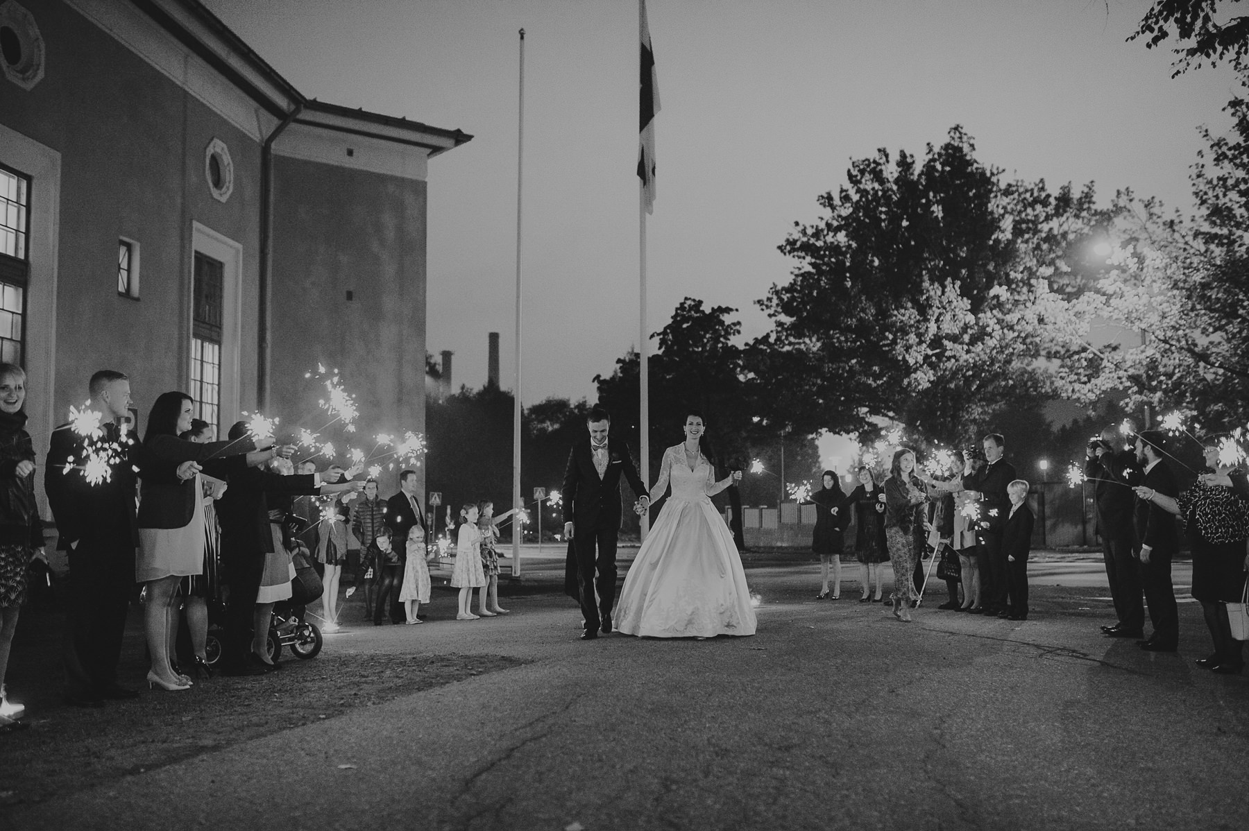 Bride and groom exiting the wedding reception